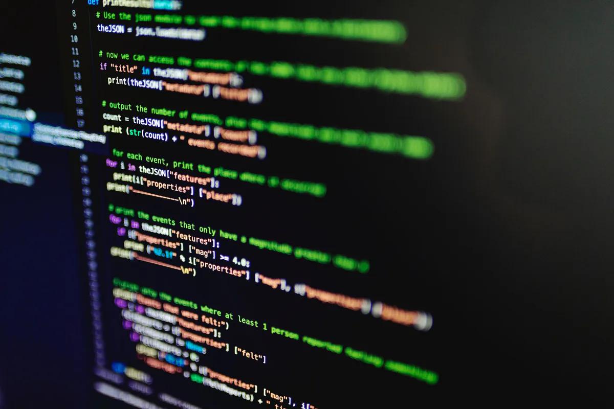 A source file open in a dark editor, the route that generates the file